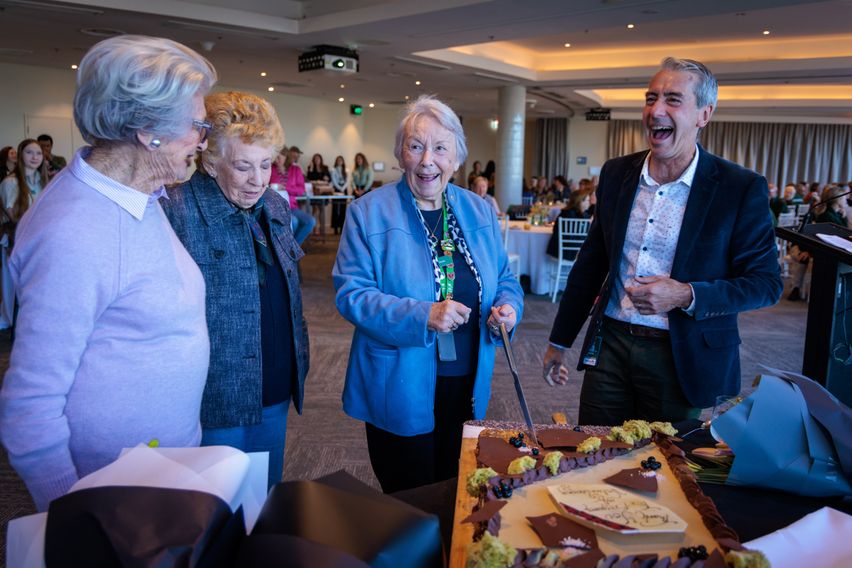 Cam Kerr with Gloria & Margaret celebrating their 50 Years Service Volunteering