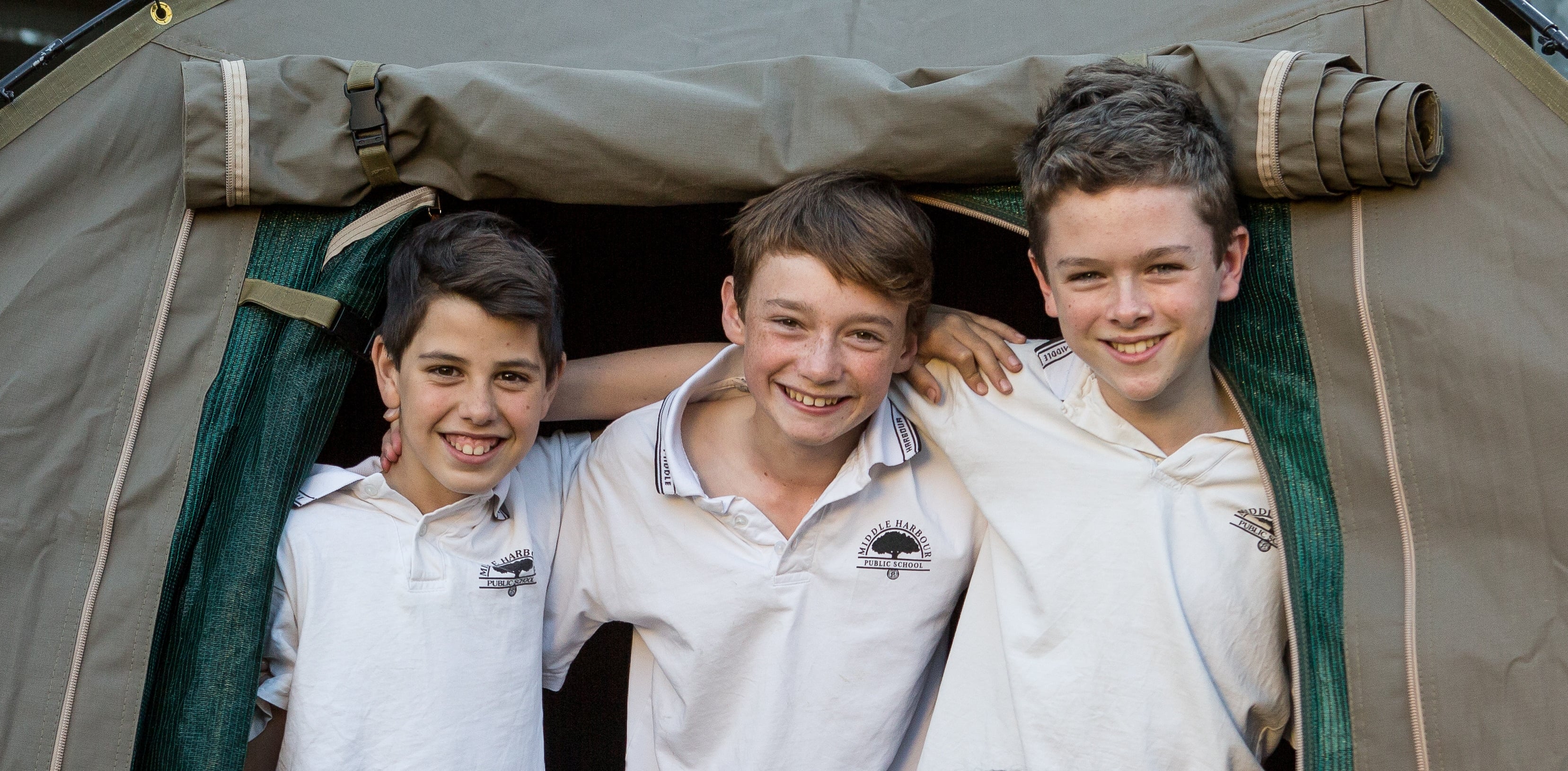Students inside safari‑style tent accommodation during a Zoosnooz overnight education experience.